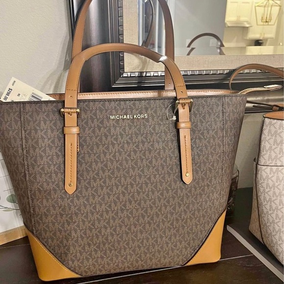 Michael Kors Handbags - Got it as a gift but I don’t like it so I’m gonna resale it